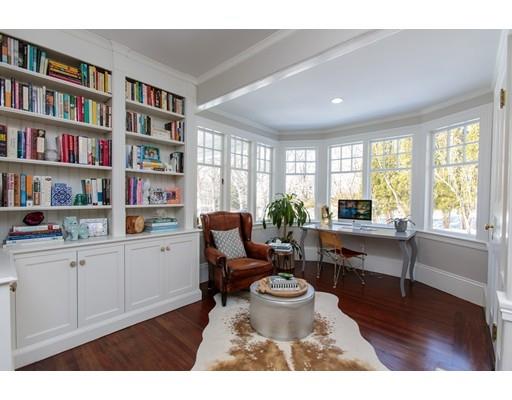 102 Abbott Road Wellesley, MA 02481 - Photo 4 of 21 a living room with furniture and a book shelf