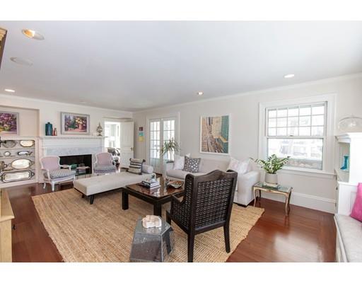 102 Abbott Road Wellesley, MA 02481 - Photo 6 of 21 a living room with furniture a fireplace and a window