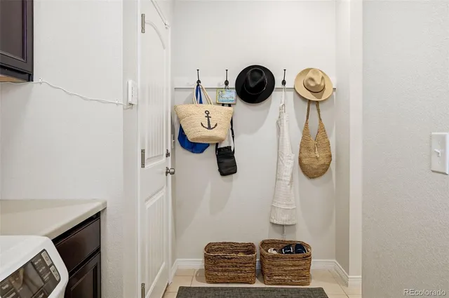 a bathroom with a refrigerator and a stove