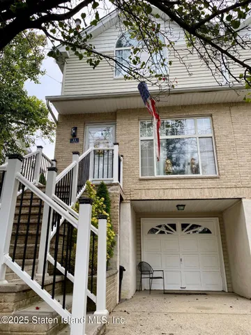 a front view of a building with balcony