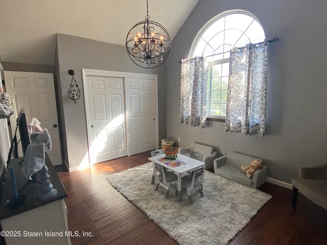 a bathroom with a sink a mirror a glass door a glass door shower and vanity