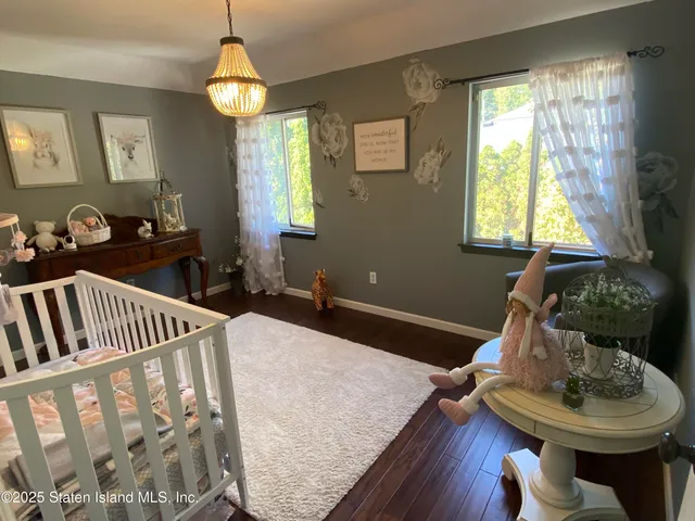 a bathroom with a toilet a sink and shower