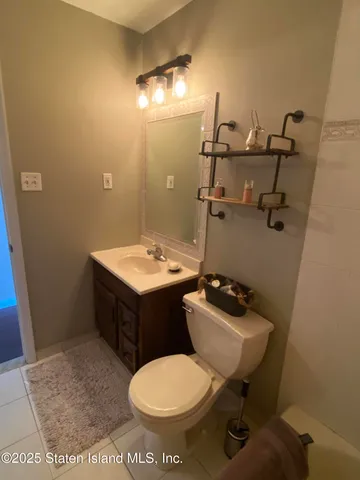 a bed room with a bed and a window