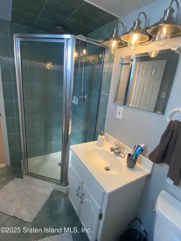 a front view of a house with trees