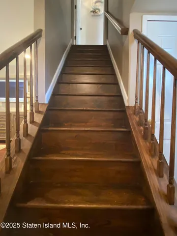 a view of street from balcony