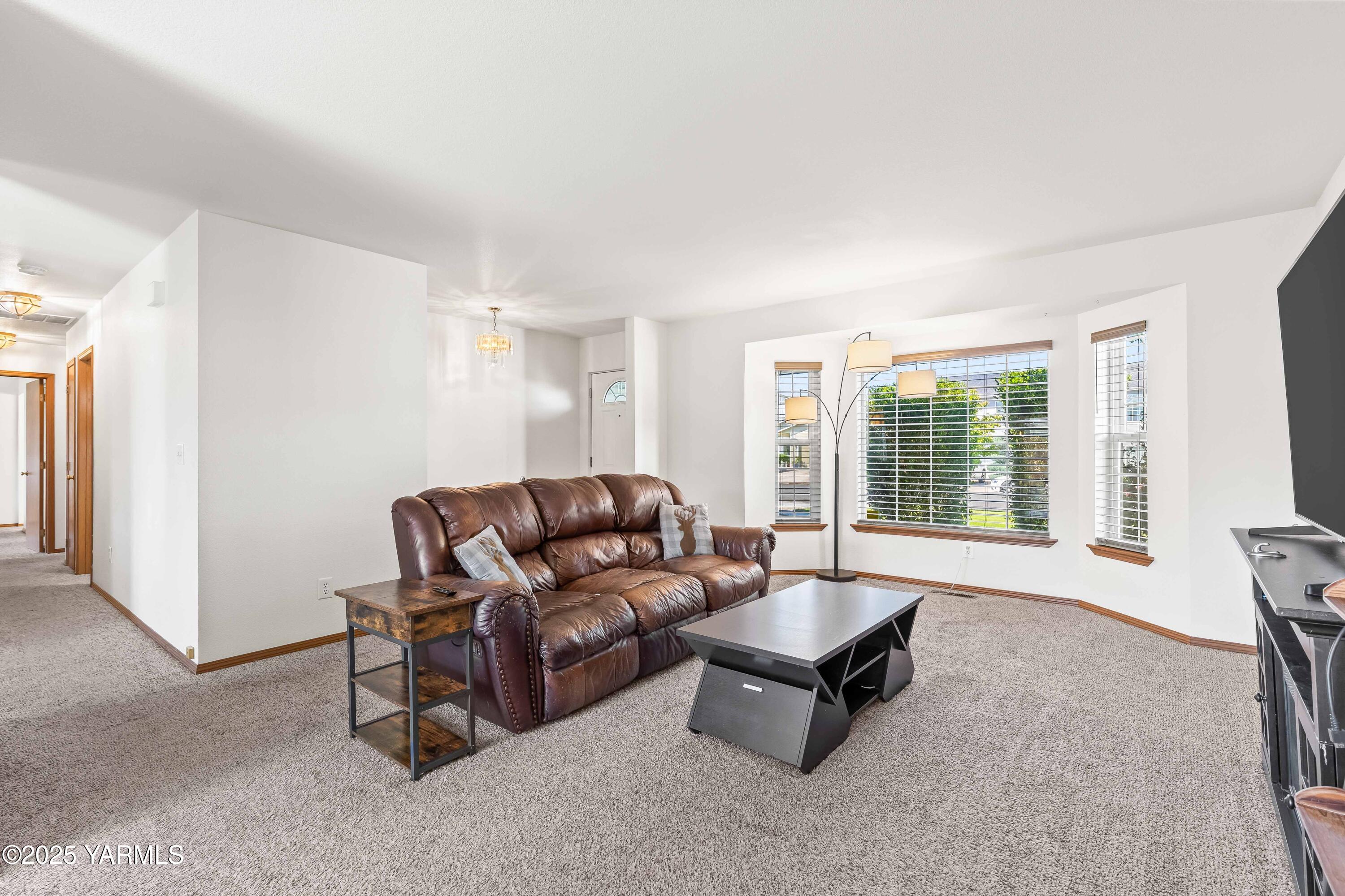 6508 Terry Avenue Yakima, WA 98908 - Photo 5 of 24 a living room with furniture and a large window