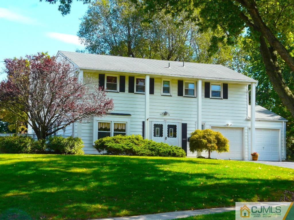 90 Drake Road Somerset, NJ 08873 - Photo 1 of 20 a front view of a house with a garden