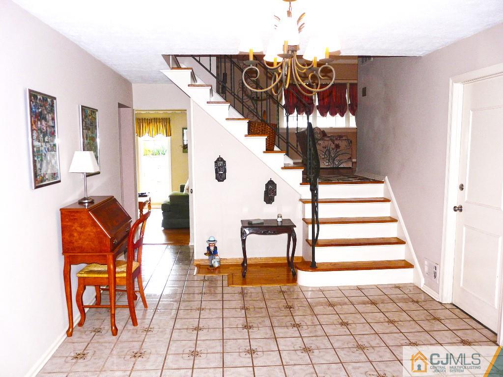 90 Drake Road Somerset, NJ 08873 - Photo 2 of 20 a view of entryway with furniture and rug