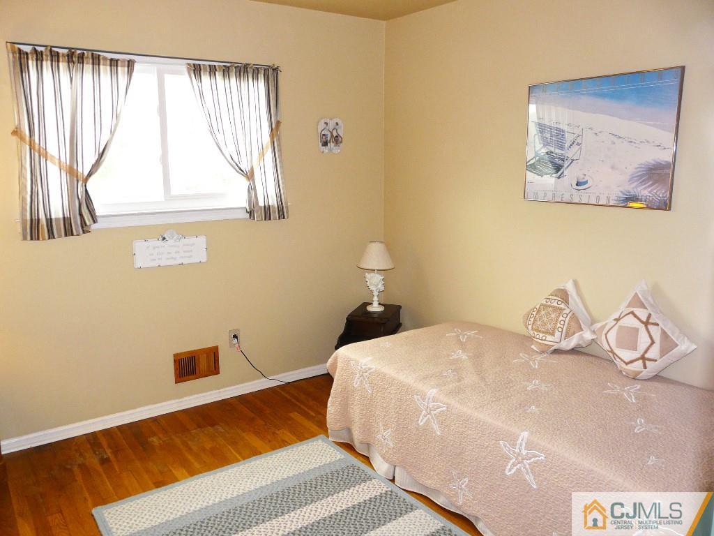 90 Drake Road Somerset, NJ 08873 - Photo 16 of 20 a bedroom with a bed and a window