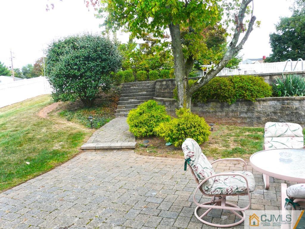 90 Drake Road Somerset, NJ 08873 - Photo 19 of 20 a view of yard with green space and seating area