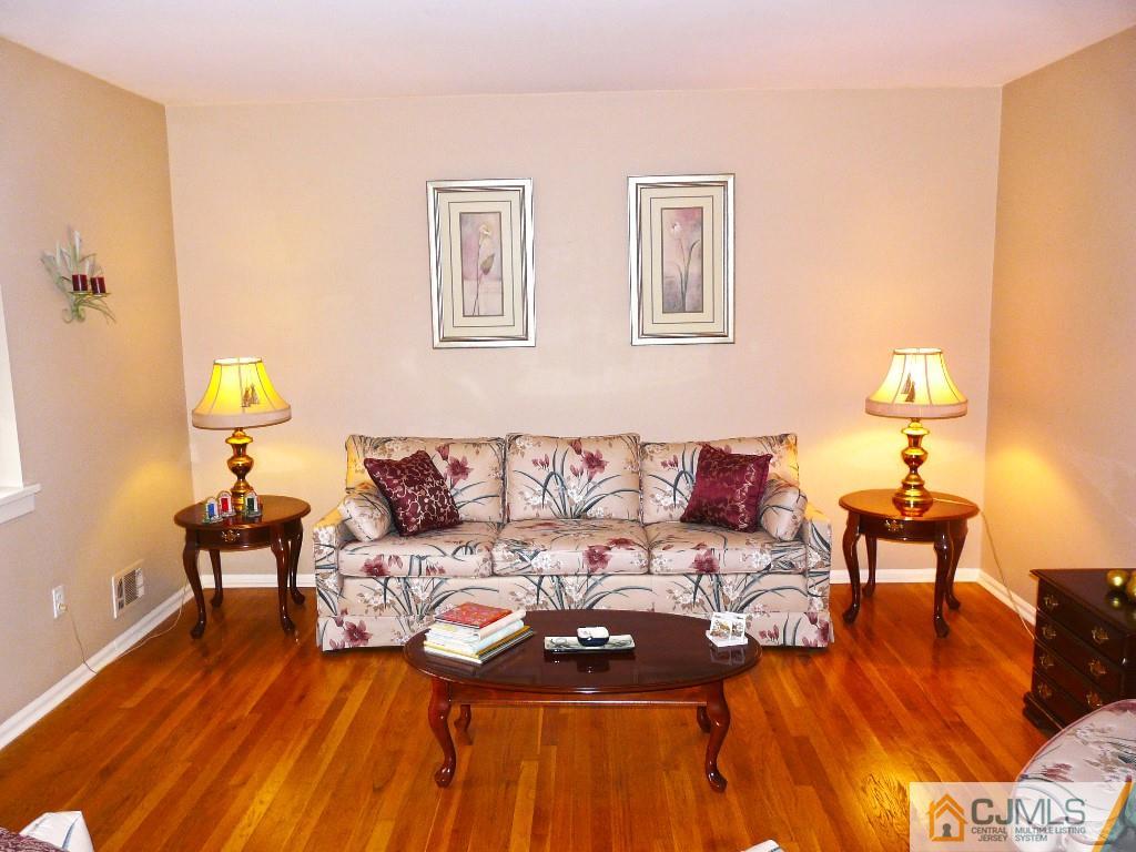 90 Drake Road Somerset, NJ 08873 - Photo 3 of 20 a living room with furniture and wooden floor