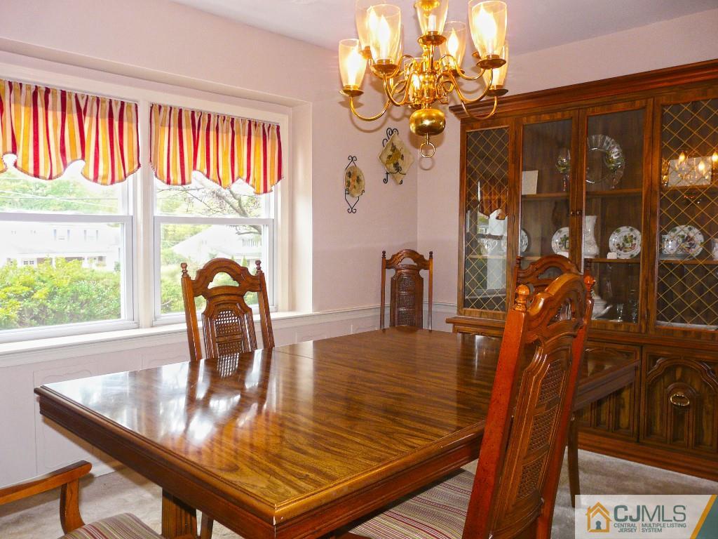 90 Drake Road Somerset, NJ 08873 - Photo 5 of 20 a view of a dining room with furniture window and outside view