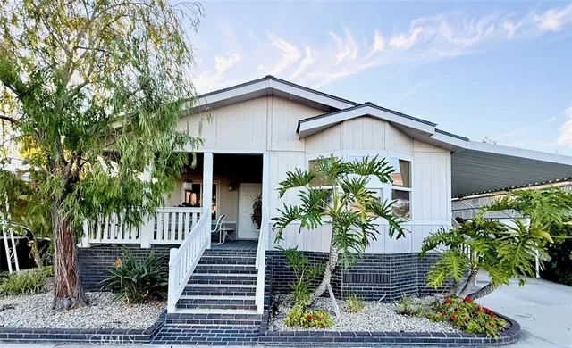 a house view with a garden space