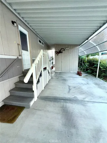 a view of entryway with stairs