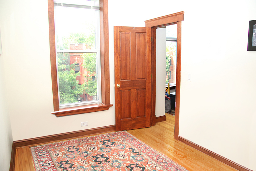 857 West Newport Avenue, Unit 3 Chicago, IL 60657 - Photo 16 of 19 a view of an empty room with a window