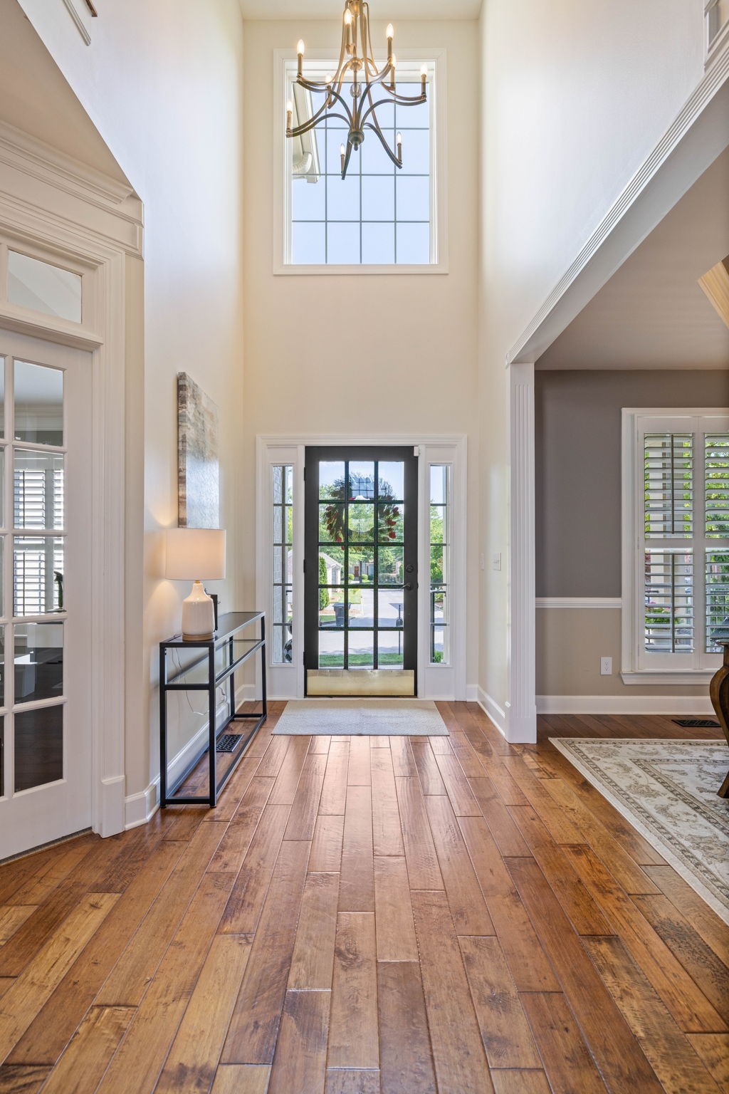 153 Cornerstone Circle Franklin, TN 37064 - Photo 11 of 70 a view of an empty room with window and wooden floor