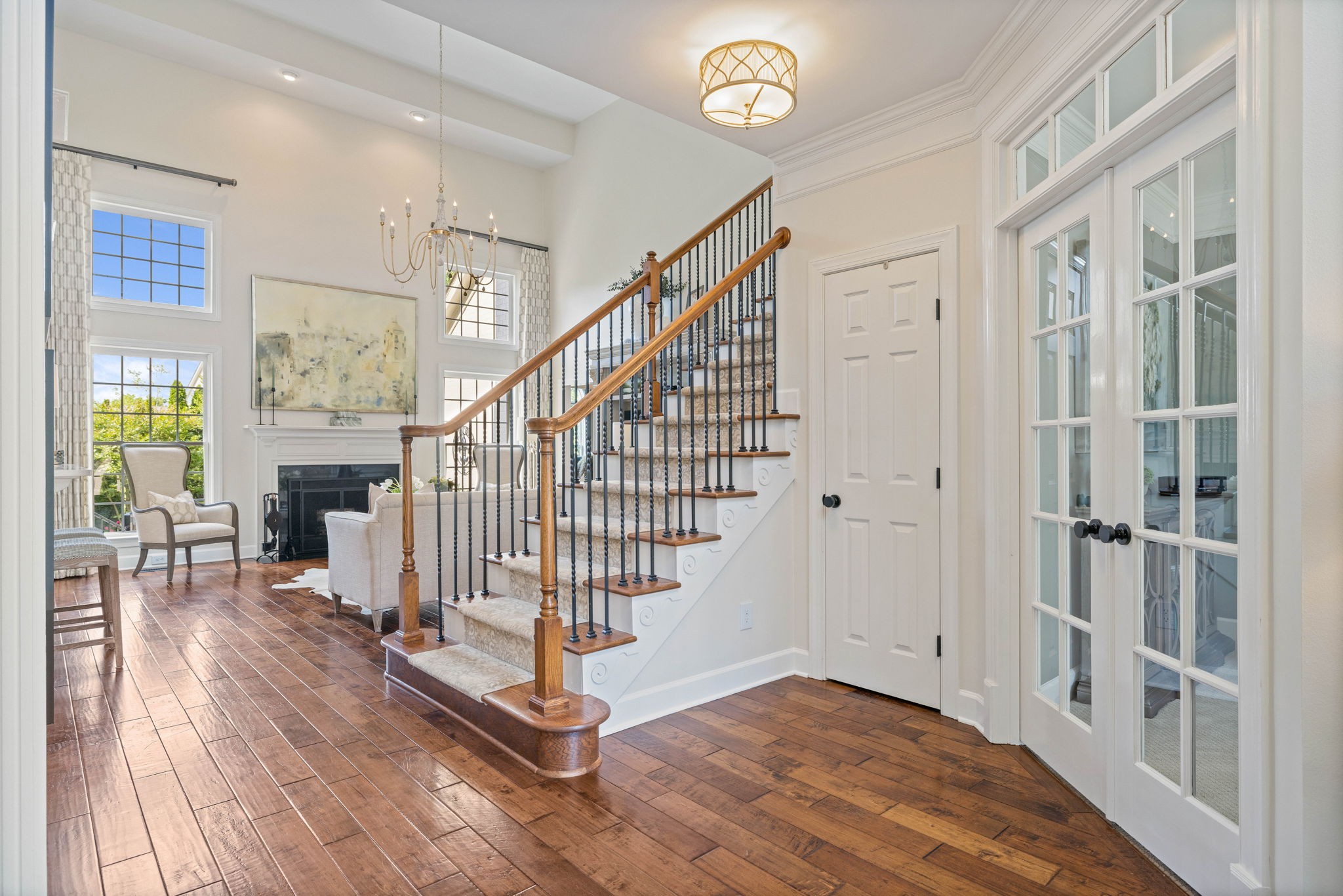 153 Cornerstone Circle Franklin, TN 37064 - Photo 12 of 70 a view of entryway with wooden floor and stairs
