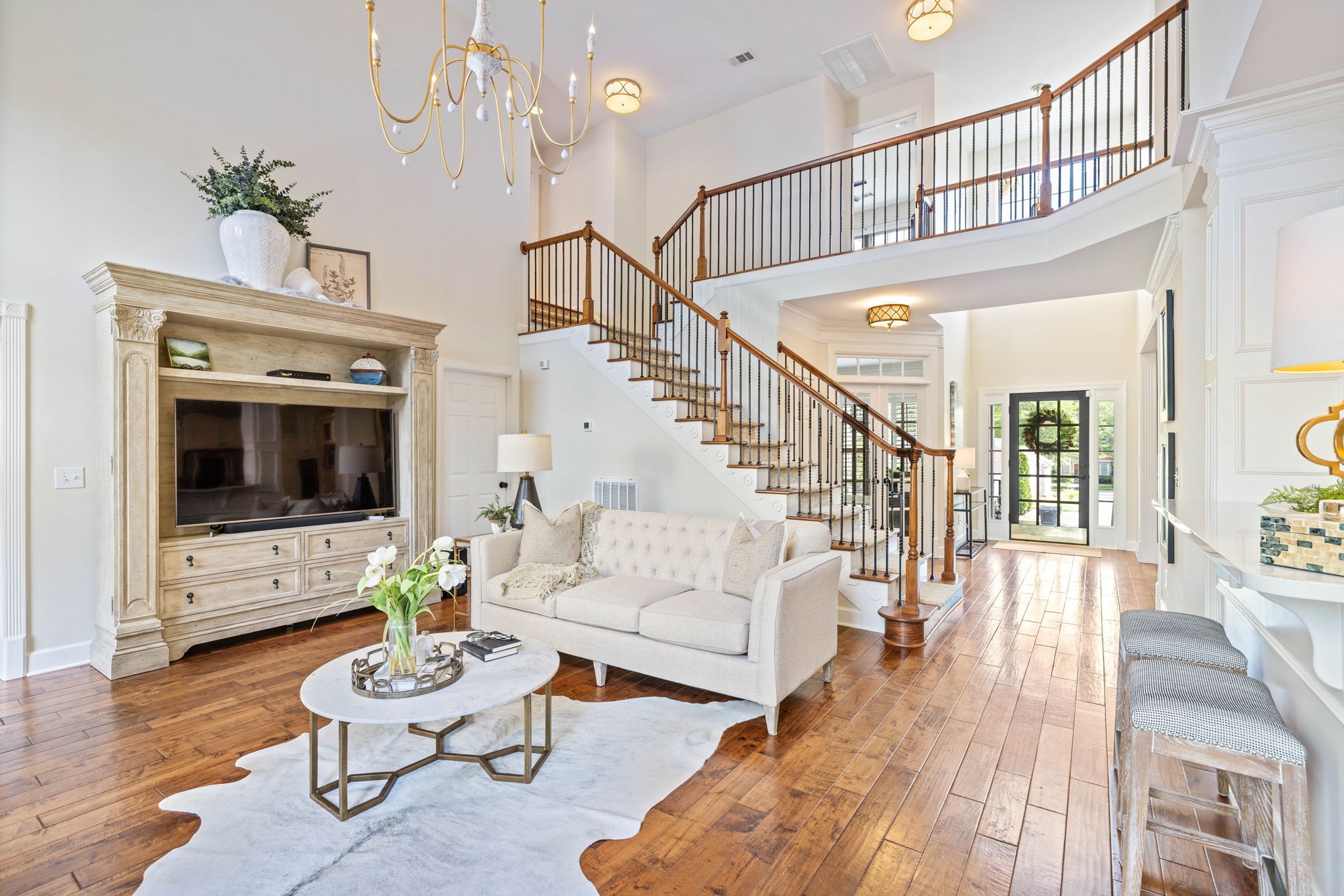 153 Cornerstone Circle Franklin, TN 37064 - Photo 13 of 70 a living room with furniture and a flat screen tv