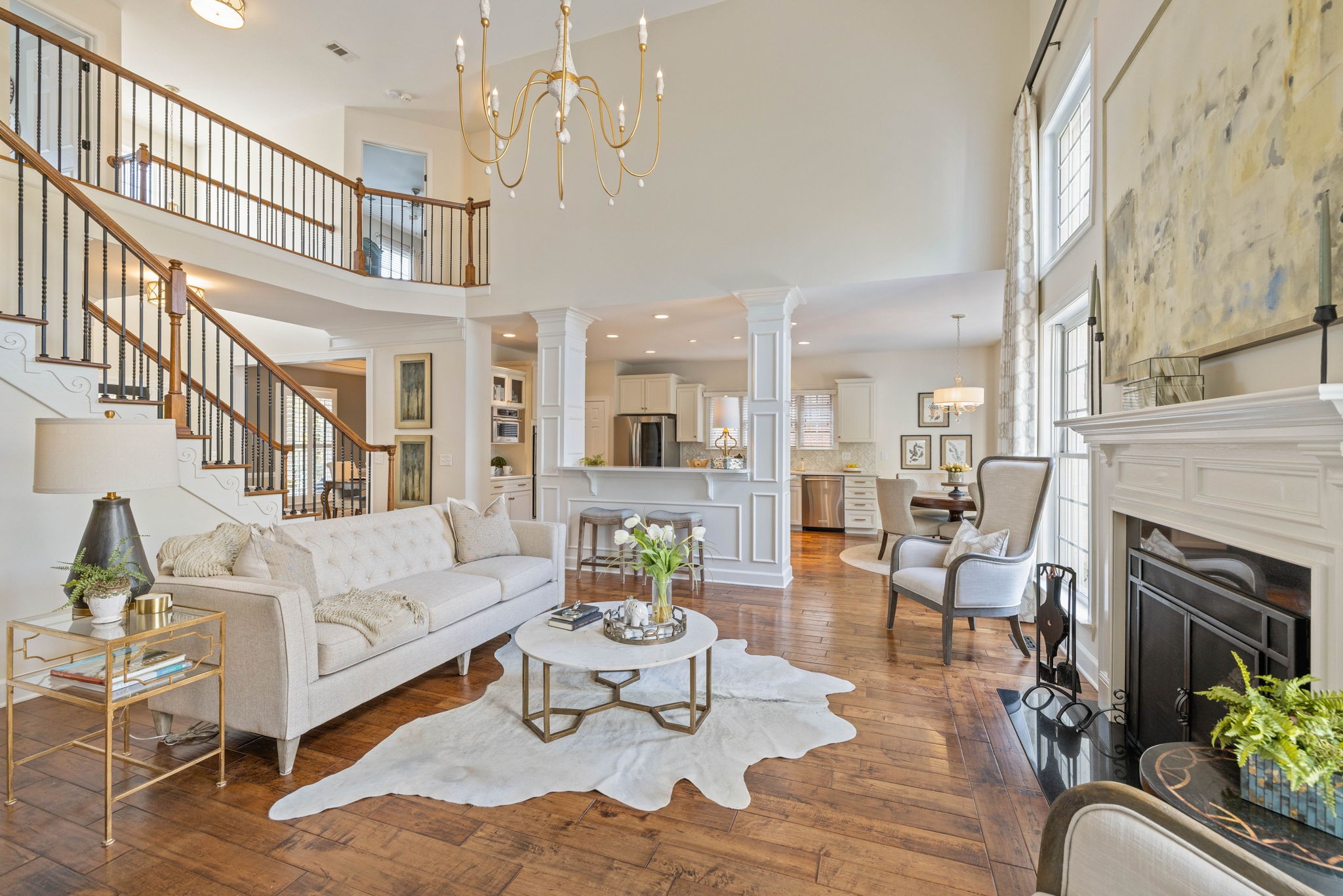 153 Cornerstone Circle Franklin, TN 37064 - Photo 15 of 70 a living room with furniture fireplace and a chandelier
