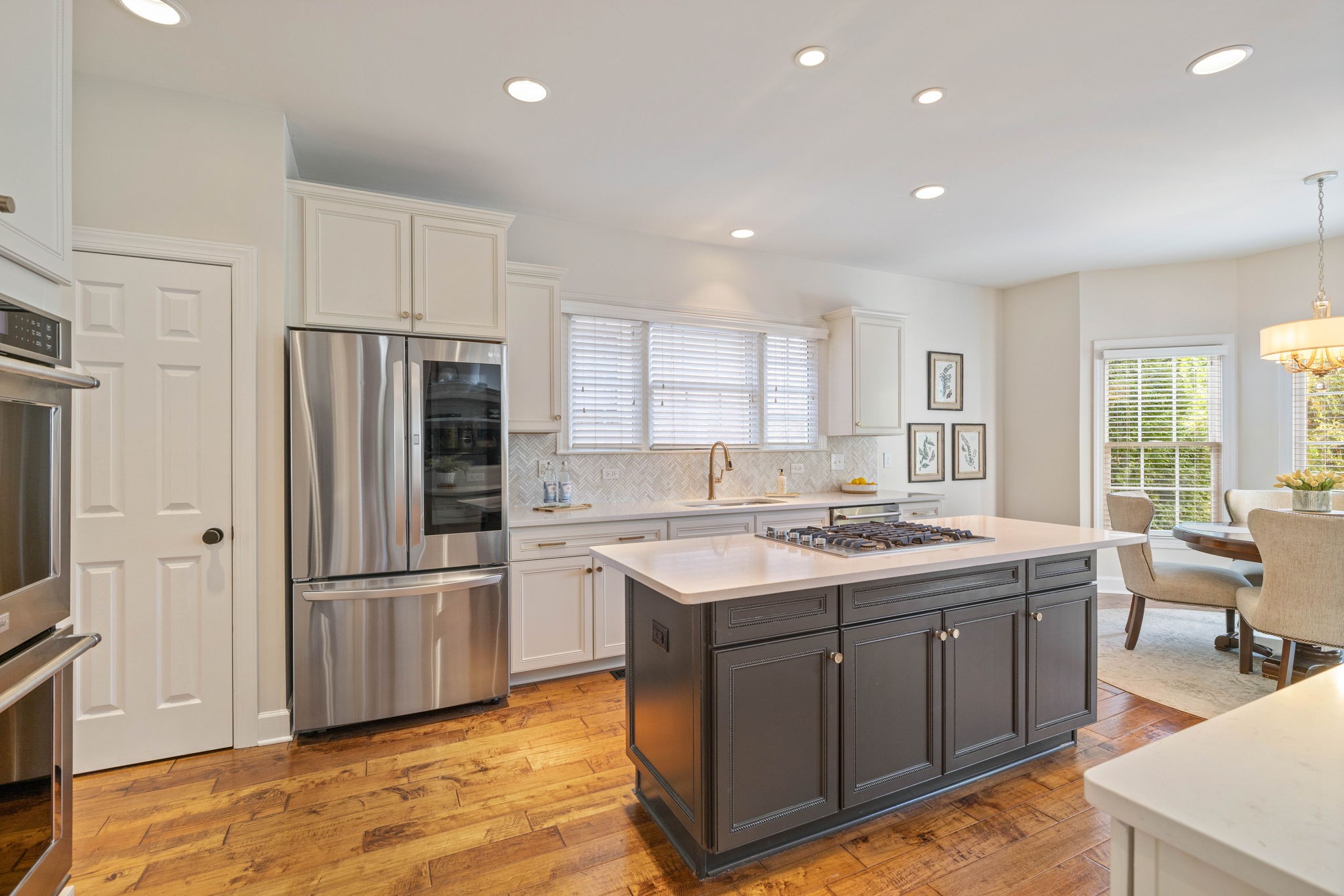 153 Cornerstone Circle Franklin, TN 37064 - Photo 20 of 70 a kitchen with a sink stove and refrigerator