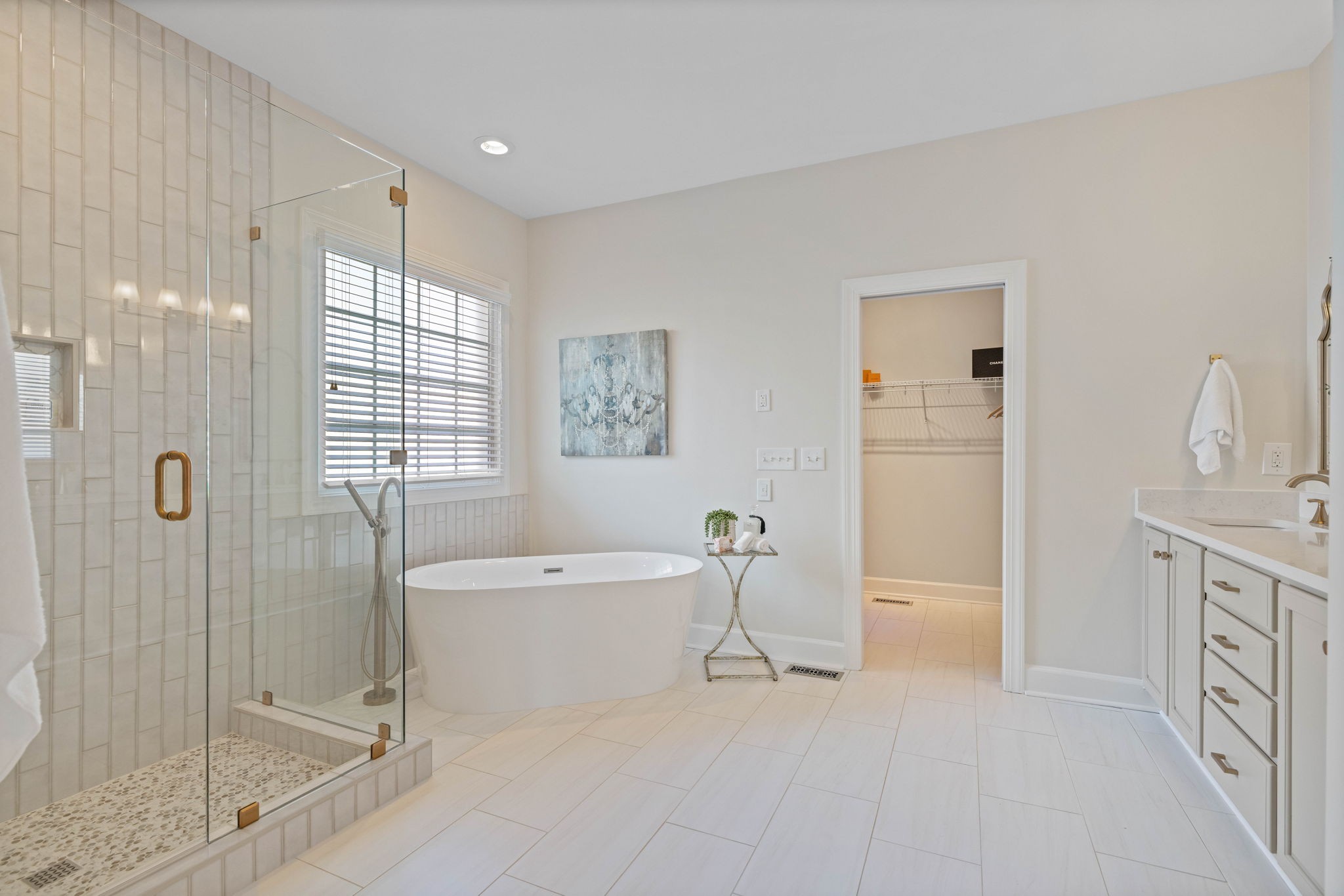 153 Cornerstone Circle Franklin, TN 37064 - Photo 35 of 70 a spacious bathroom with a double vanity sink a mirror and a bathtub