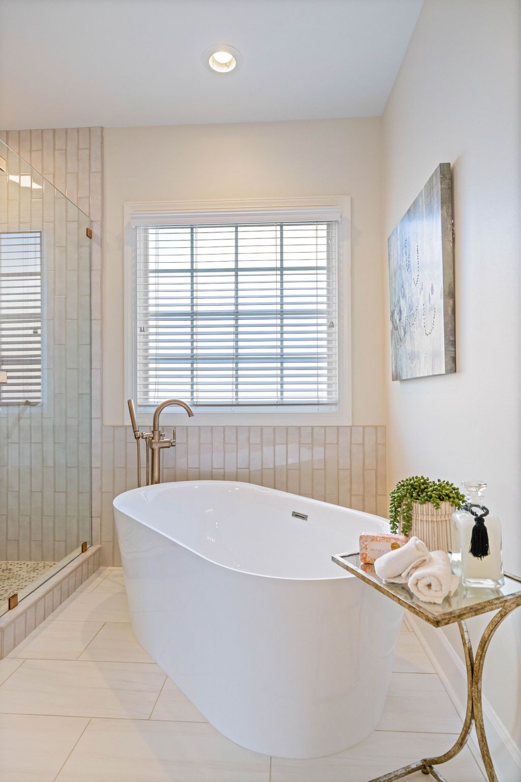 153 Cornerstone Circle Franklin, TN 37064 - Photo 37 of 70 a white bath tub sitting in a bathroom next to a window