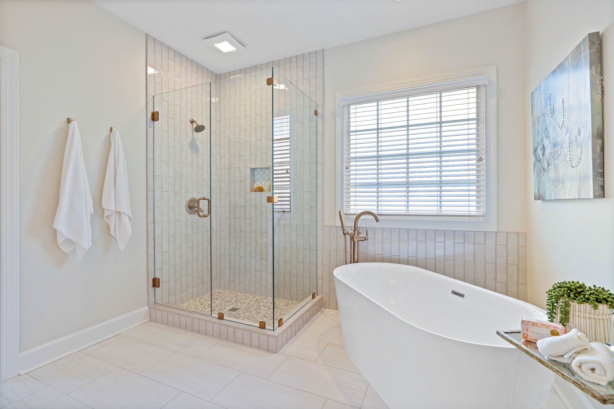 153 Cornerstone Circle Franklin, TN 37064 - Photo 38 of 70 a bathroom with a tub shower and window