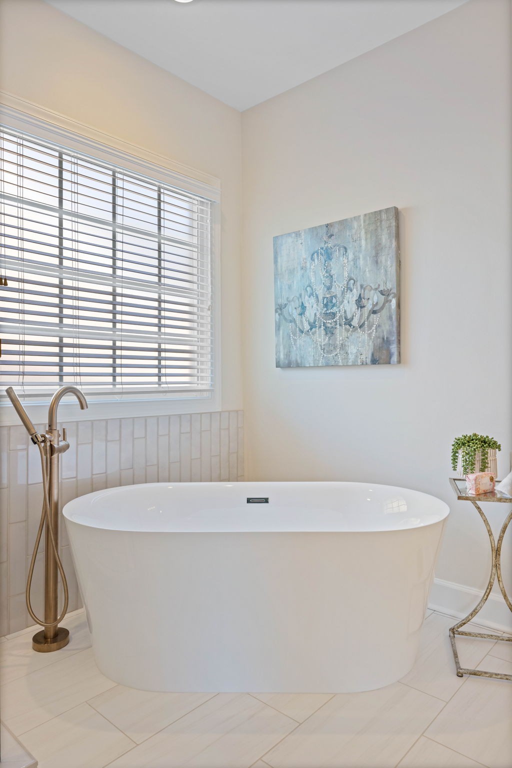 153 Cornerstone Circle Franklin, TN 37064 - Photo 39 of 70 a bath tub sitting in a bathroom next to a window