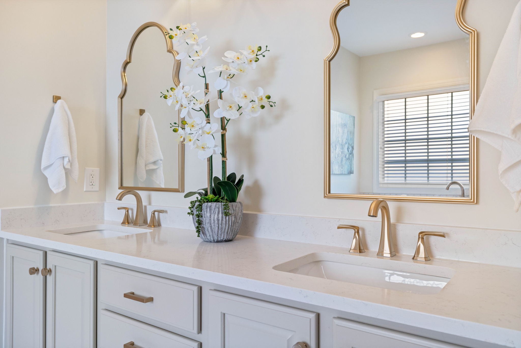 153 Cornerstone Circle Franklin, TN 37064 - Photo 40 of 70 a bathroom with a sink a potted plant and a window