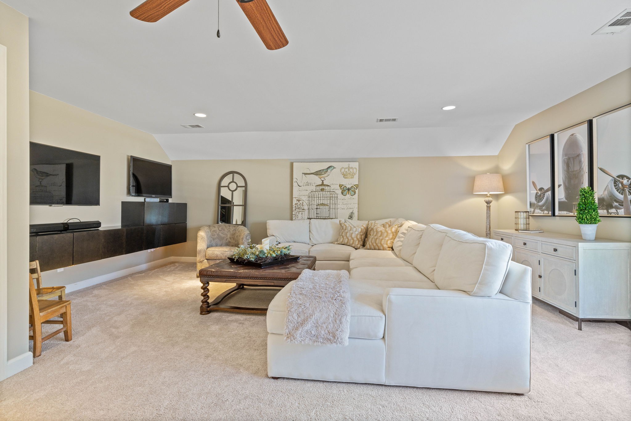 153 Cornerstone Circle Franklin, TN 37064 - Photo 44 of 70 a living room with furniture and a flat screen tv