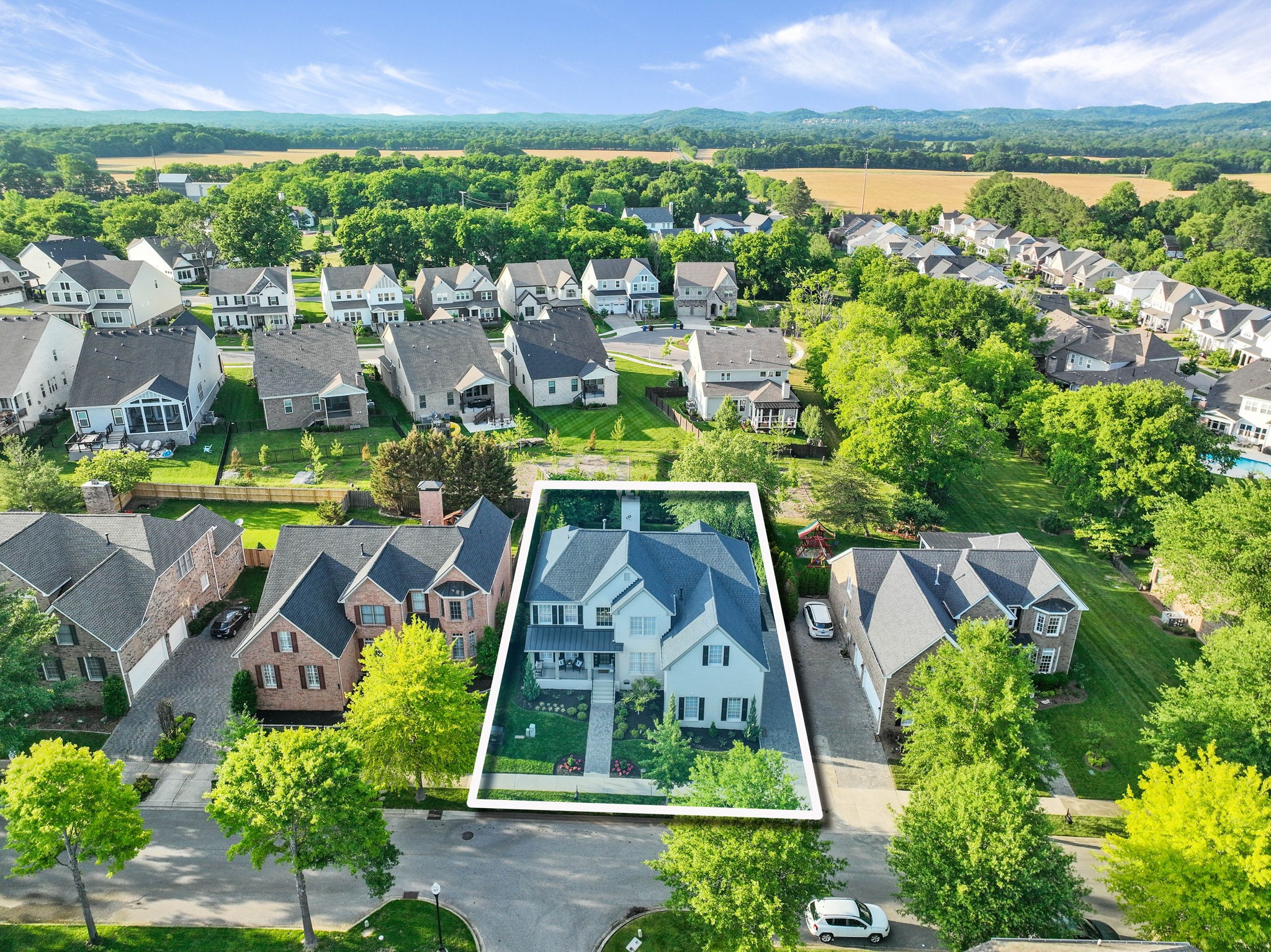 153 Cornerstone Circle Franklin, TN 37064 - Photo 67 of 70 an aerial view of residential houses with outdoor space and swimming pool