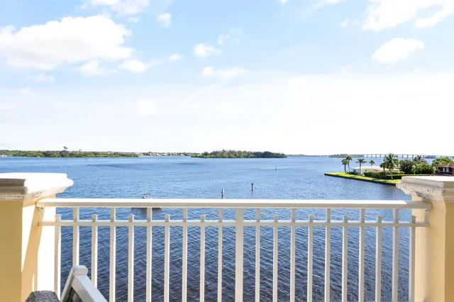 a view of a swimming pool with chairs