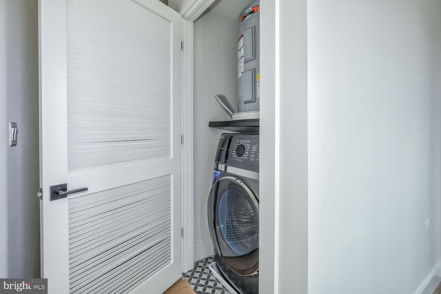 4347 Harrison Street Northwest, Unit 7 Washington, DC 20015 - Photo 21 of 28 a utility room with dryer and washer