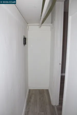a bathroom with a toilet and a bathtub