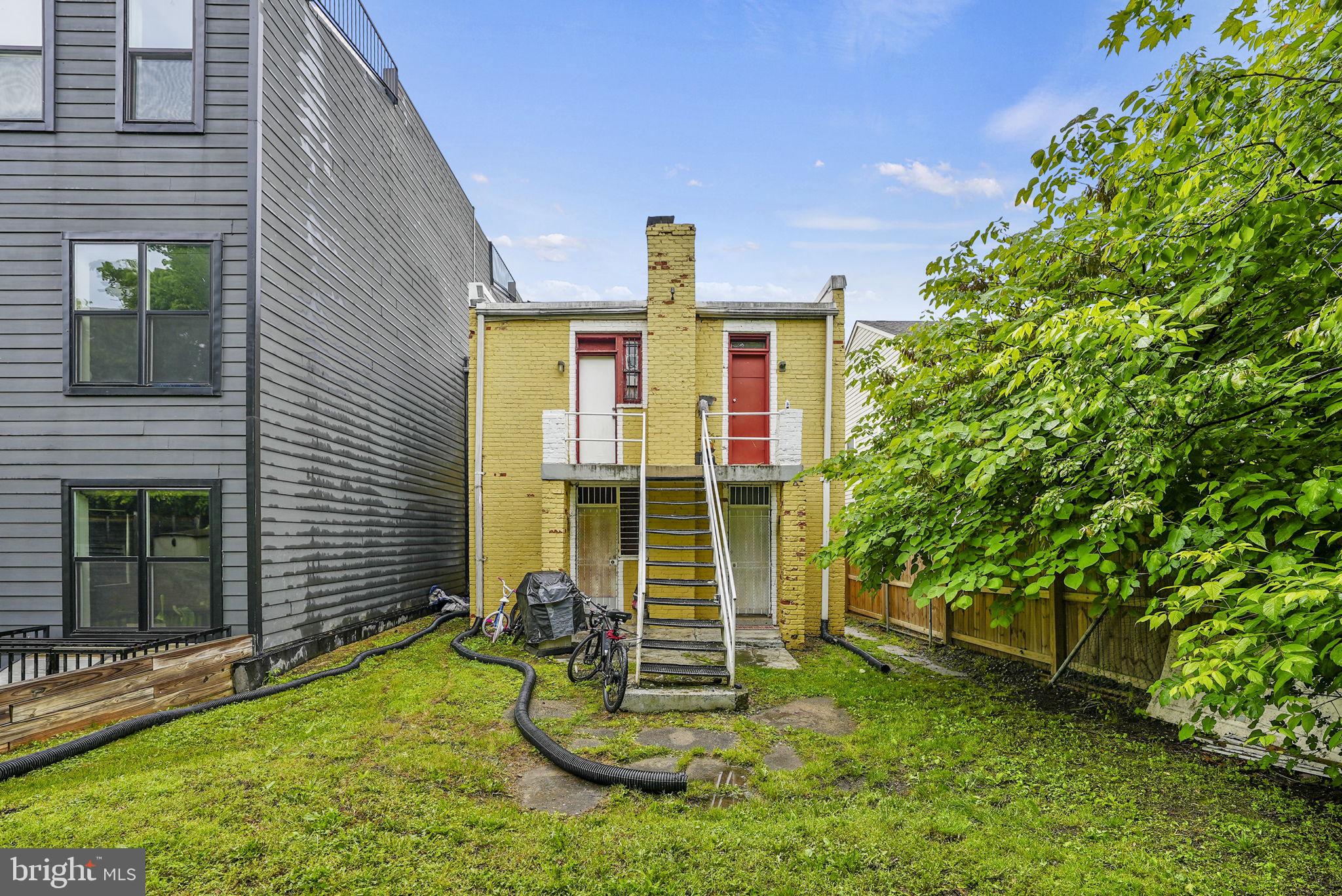 1942 Capitol Avenue Northeast Washington, DC 20002 - Photo 17 of 24 front view of a house with a yard