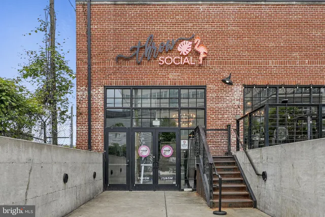 a front view of a building with glass windows