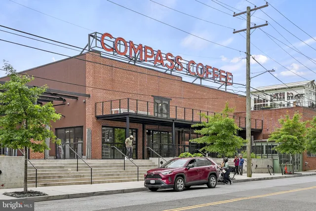 a view of a street with cars