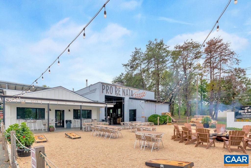 Three Old Three Notch'd Road Charlottesville, VA 22901 - Photo 12 of 24 a view of a house with backyard and sitting area