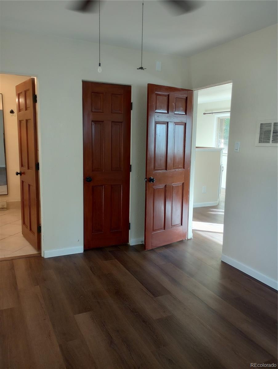 111 Crystal Park Road, Unit 1 Manitou Springs, CO 80829 - Photo 12 of 28 a view of empty room with wooden floor