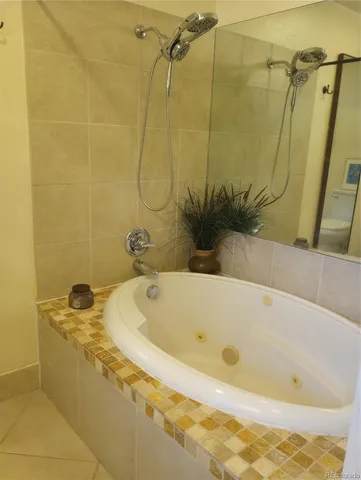 a bathroom with a bath tub