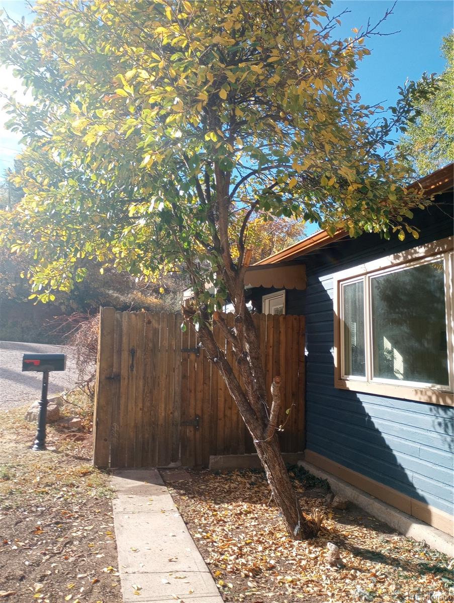111 Crystal Park Road, Unit 1 Manitou Springs, CO 80829 - Photo 19 of 28 a view of a entrance gate of a house