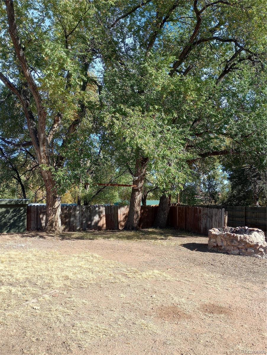 111 Crystal Park Road, Unit 1 Manitou Springs, CO 80829 - Photo 25 of 28 a view of a house with a tree