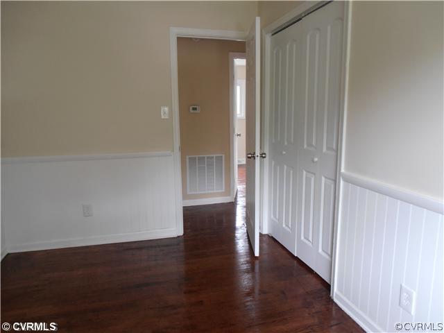 6316 Barrister Road Chesterfield, VA 23832 - Photo 8 of 12 a view of a hallway with wooden floor