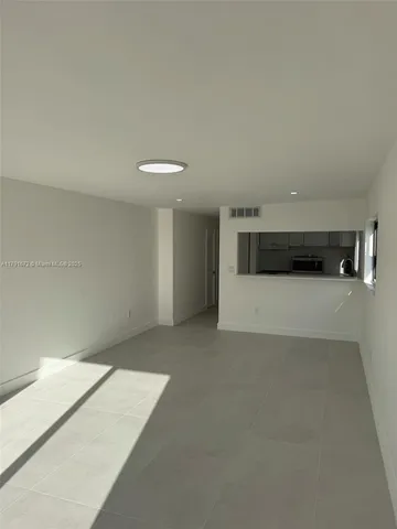 a view of a livingroom with an empty space