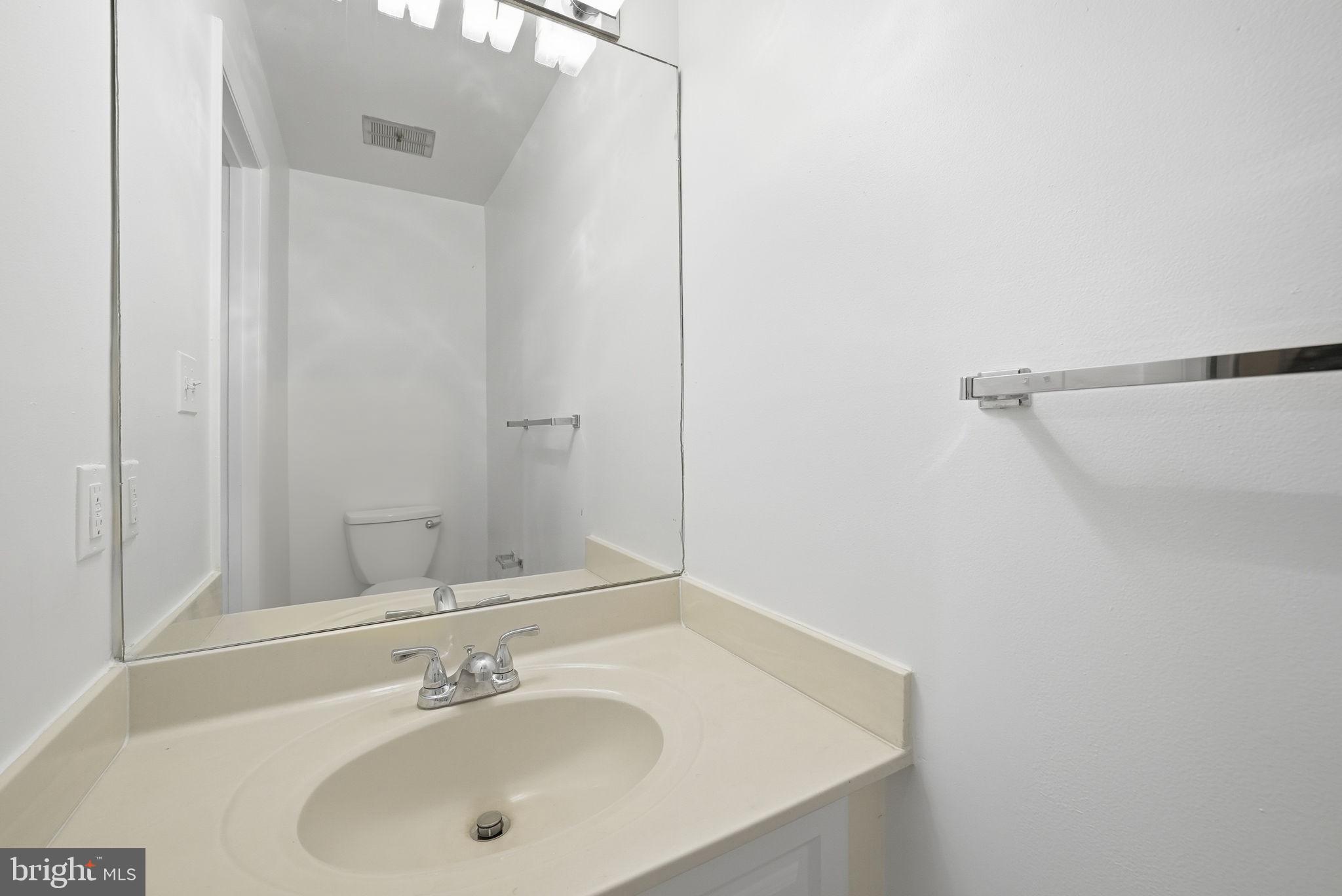 1049 Michigan Avenue Northeast, Unit 1049 Washington, DC 20017 - Photo 18 of 38 Convenient half bath on main level