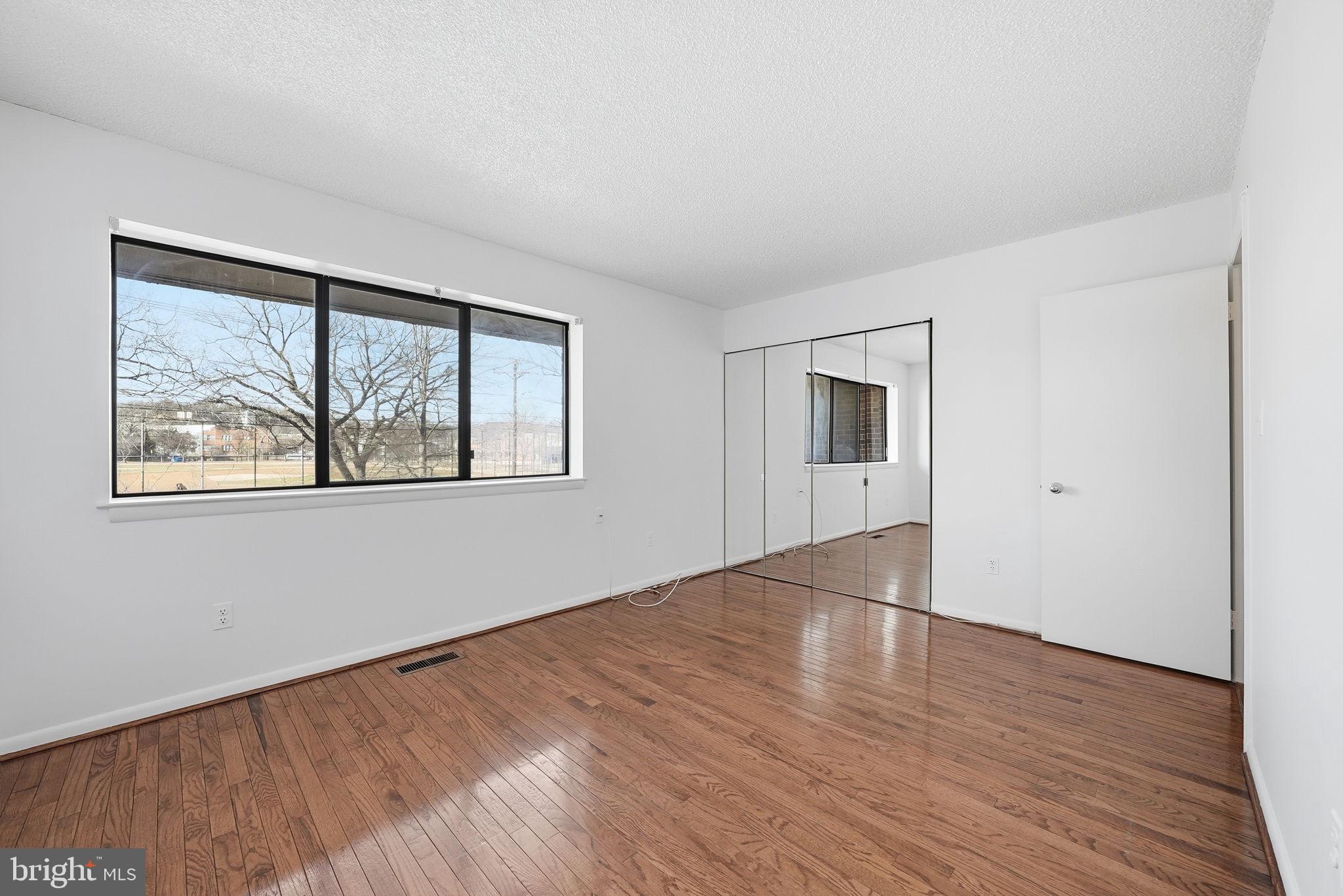 1049 Michigan Avenue Northeast, Unit 1049 Washington, DC 20017 - Photo 20 of 38 Primary Bedroom overlooking the park