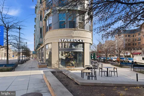 a view of a building with a stores