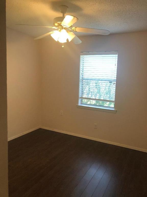 504 Chinner Street Bonham, TX 75418 - Photo 11 of 11 an empty room with a window