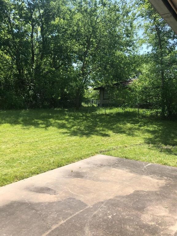 504 Chinner Street Bonham, TX 75418 - Photo 9 of 11 a view of a park with large trees