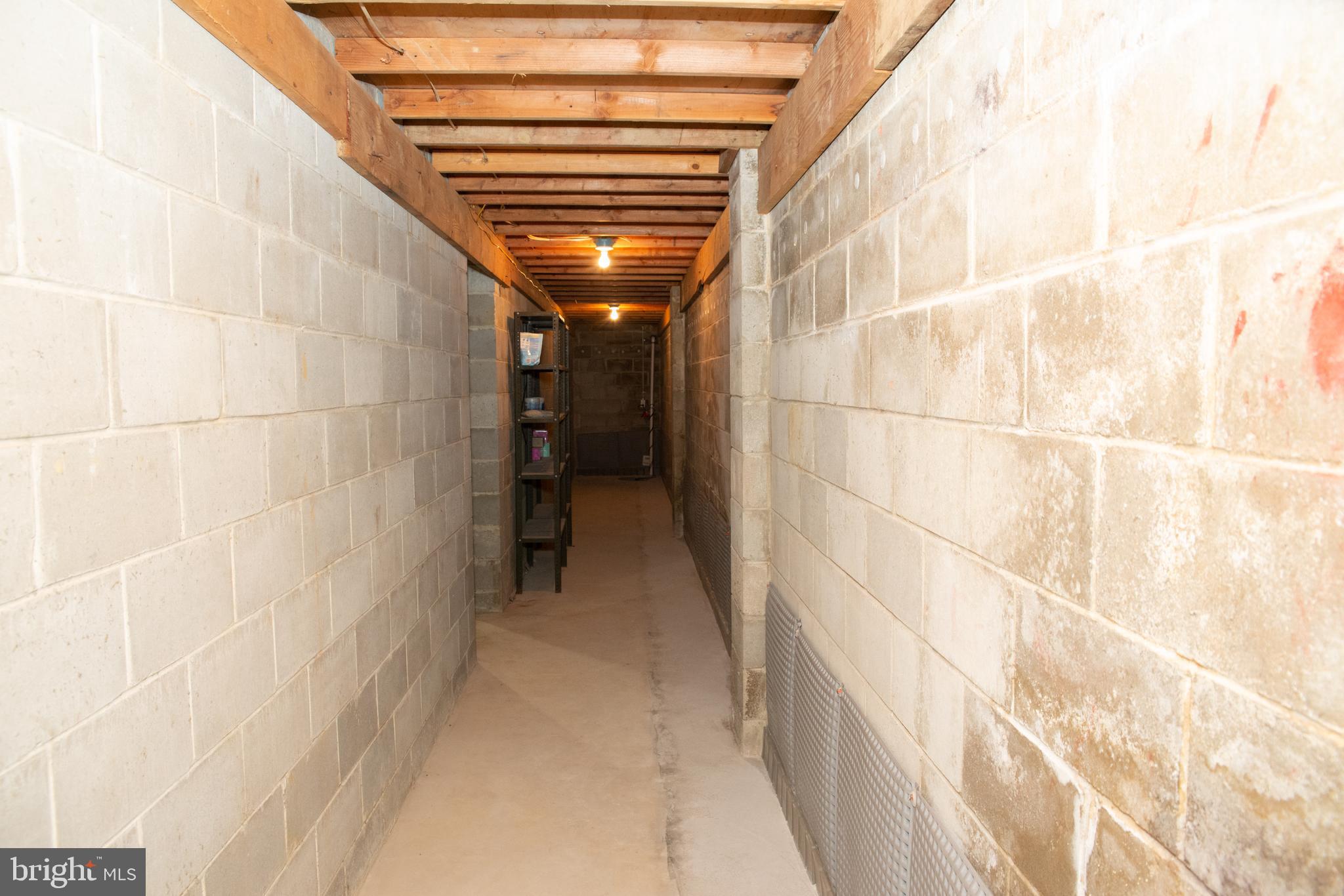 73 Ellisdale Road Allentown, NJ 08501 - Photo 47 of 49 Extra basement under porch. Wine cellar?